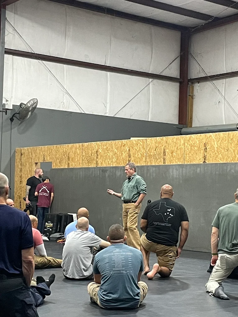 Instructor speaking to students during training seminar