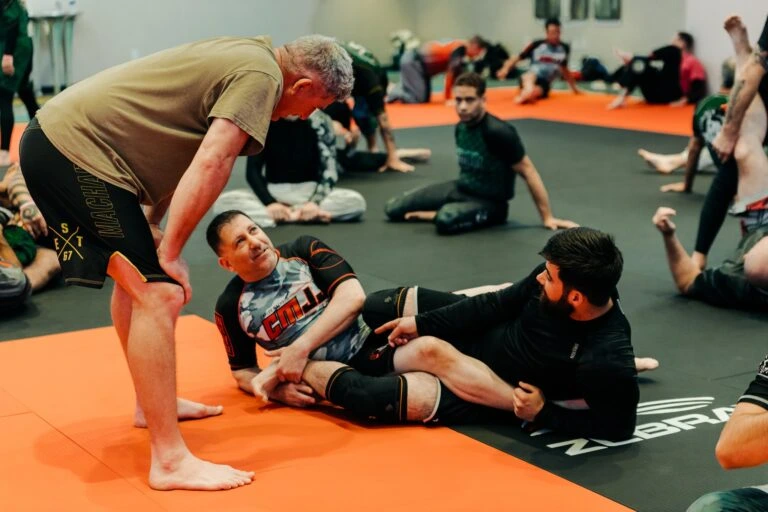 Brazilian Jiu Jitsu students practicing on the mat