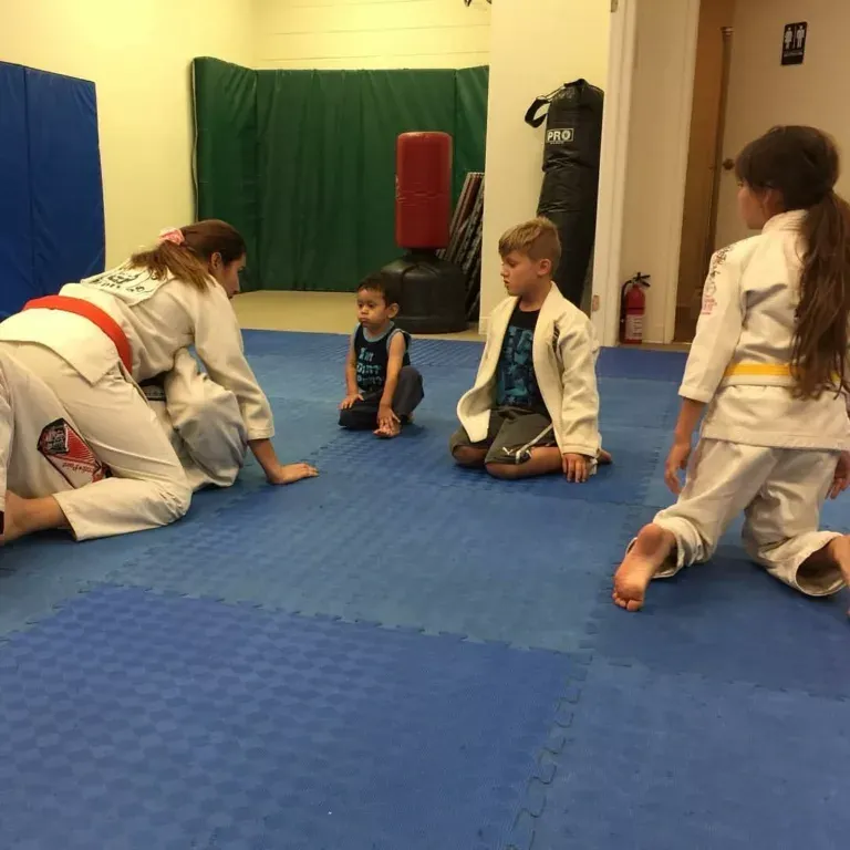 Kids class training on the mat at Roll Dogs Jiu Jitsu