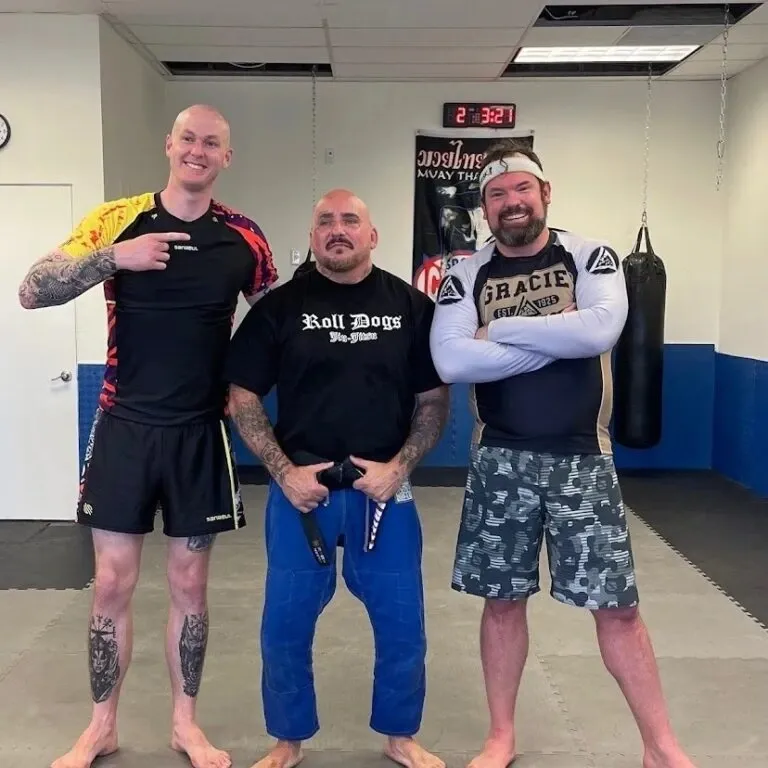 Students posing at Roll Dogs Jiu Jitsu